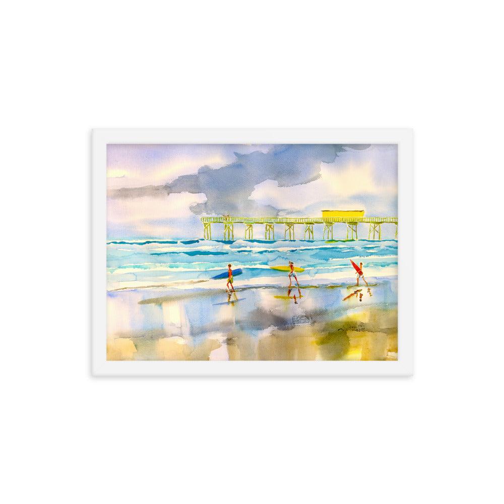 Surfers heading out to the ocean Framed poster - Julianne Felton