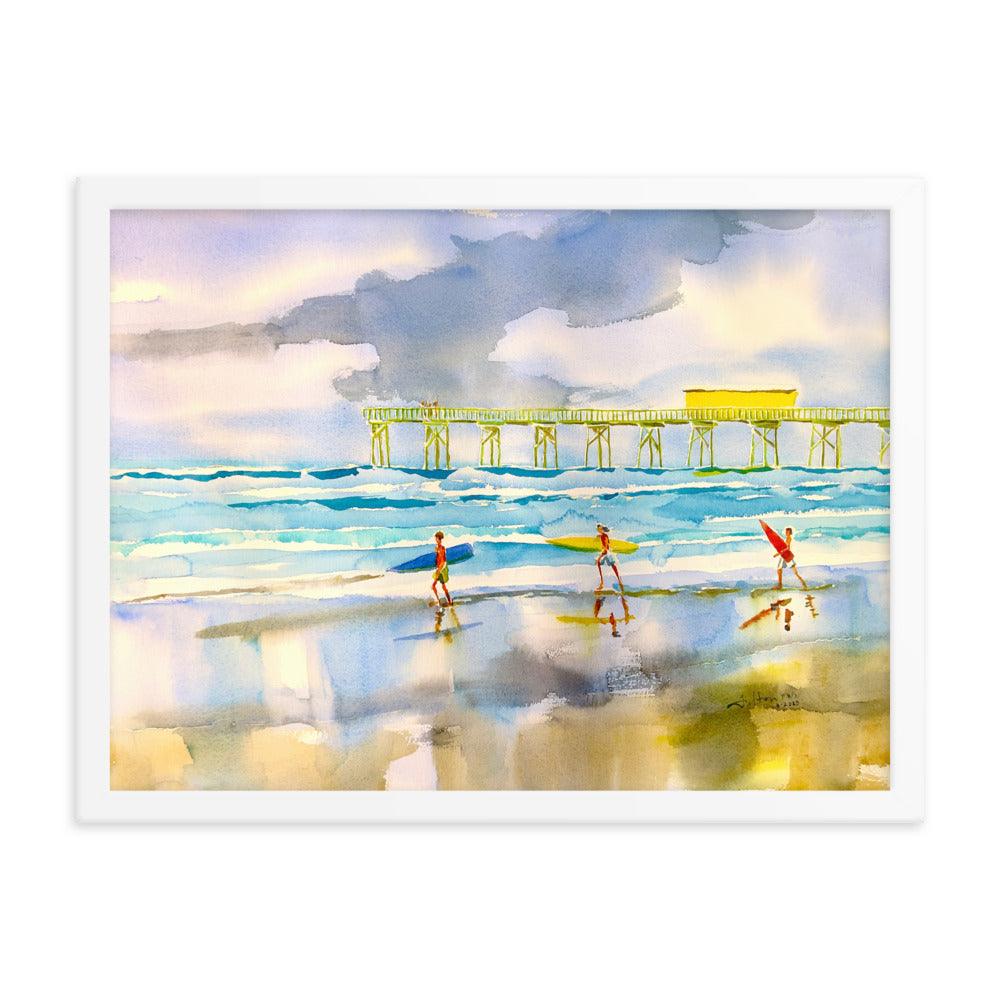 Surfers heading out to the ocean Framed poster - Julianne Felton